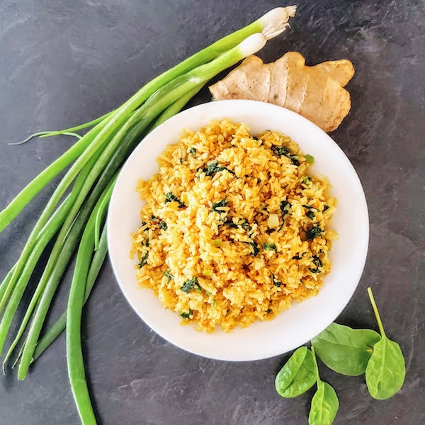 tumeric fried rice with scallion and spinach